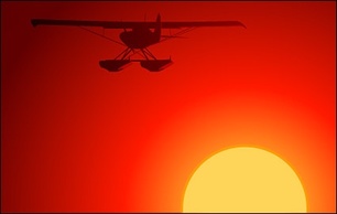 Aircraft under the Sunset vector material